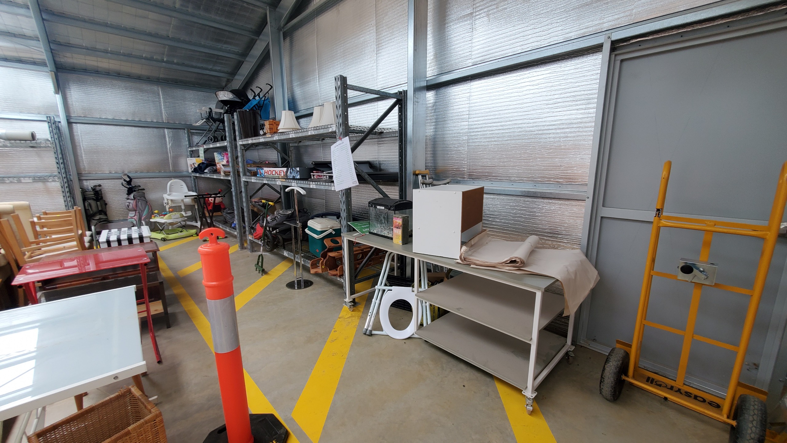 Strollers, sporting equipment, lamp shades, air hockey table, esky, fish tank